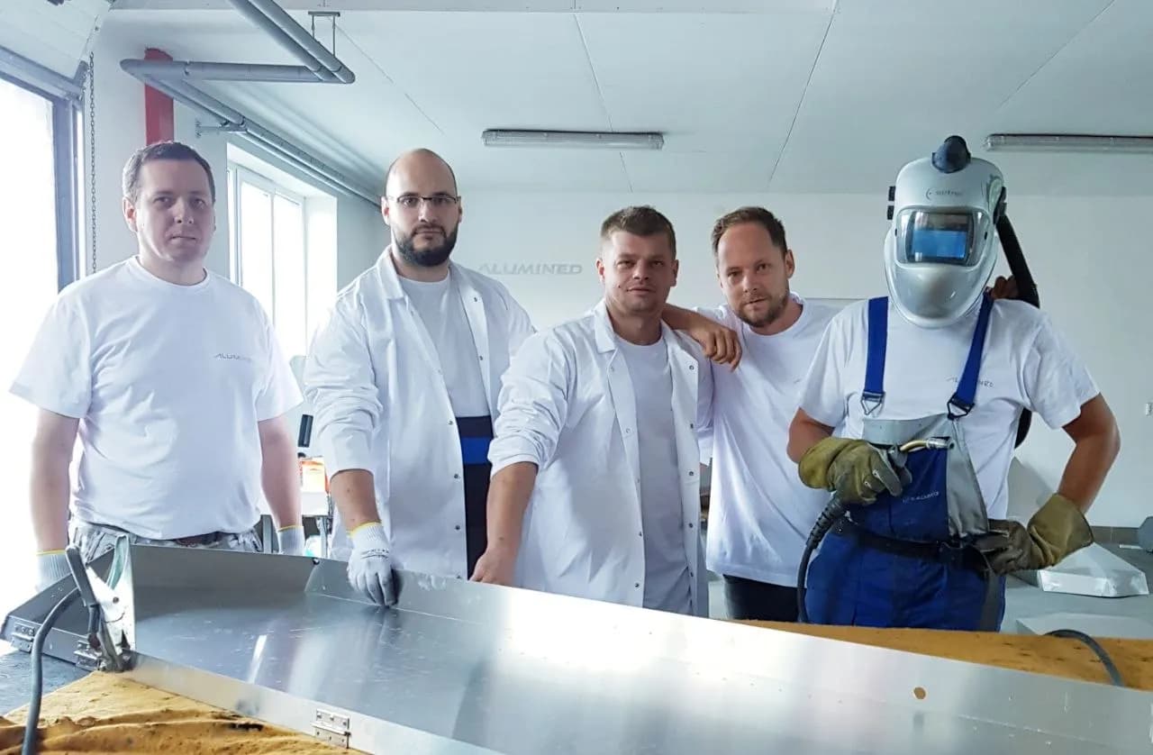 Alumined production team