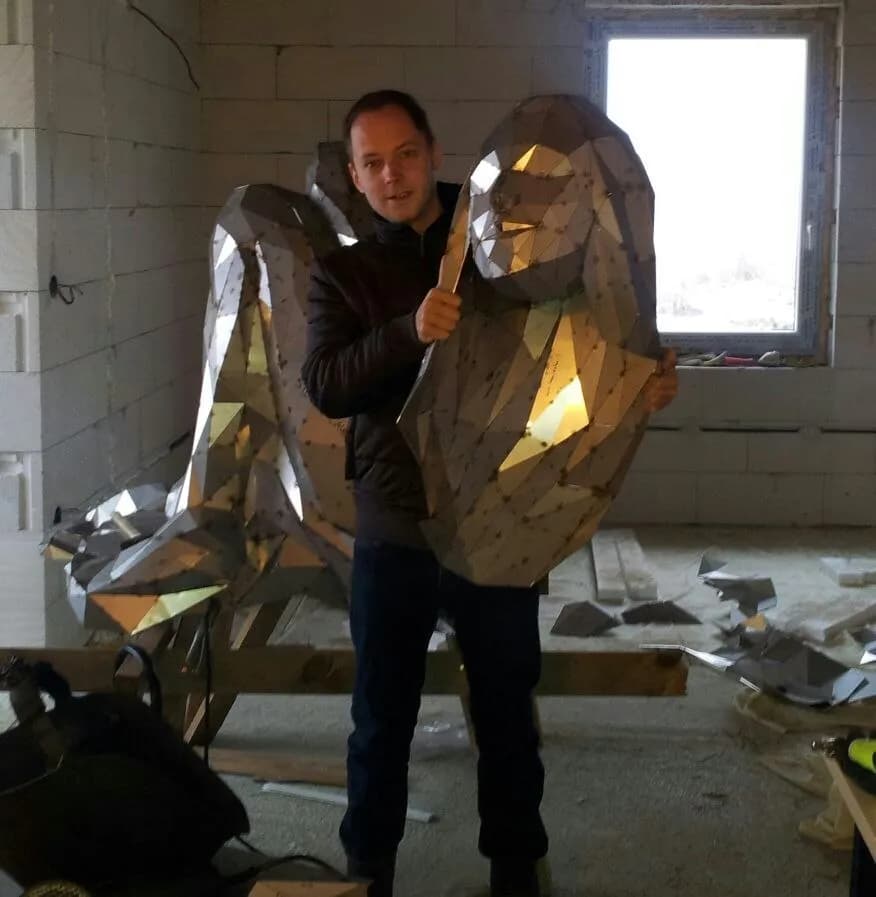 Juraj with sculpture in workshop
