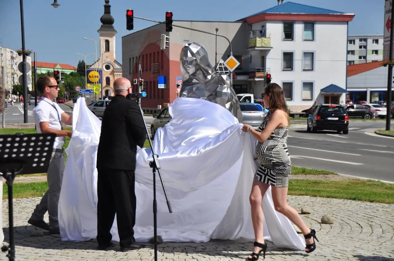 Chrome sculpture unveiling