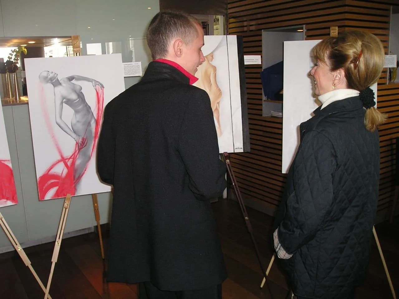 Visitors at painting exhibition
