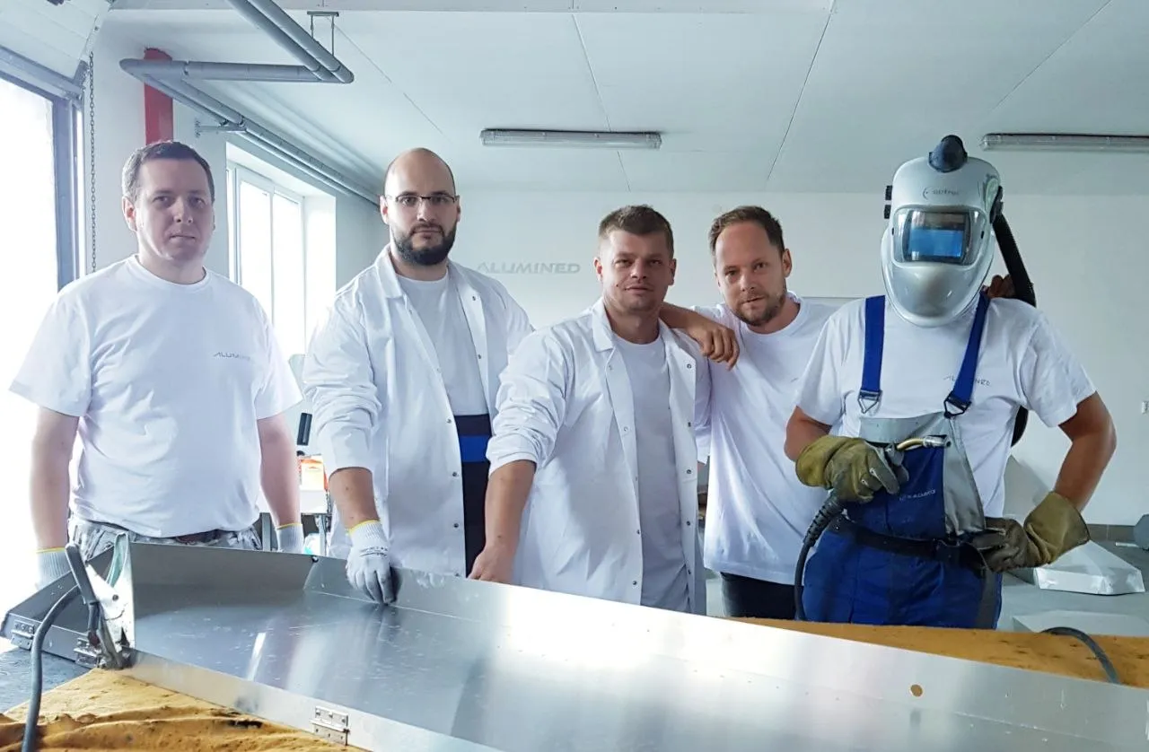 Alumined production team